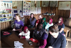 The nutrition team (front row right to left: myself, Grace, Michaela; back row right: Sarah) and vet students Ren and Julia (back row, left) sitting in on some English classes.